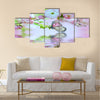 Pink flower of an Oriental cherry in and butterfly Multi Panel Canvas Wall Art