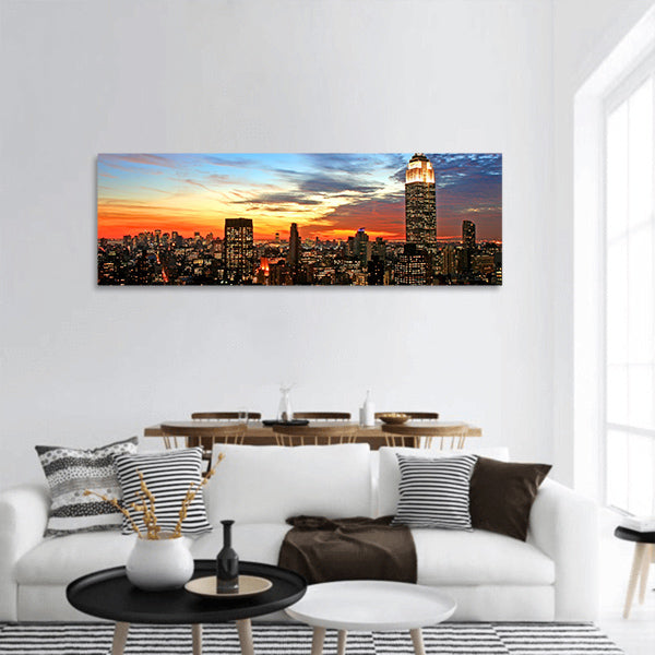 New York City midtown skyline at dark Panoramic Canvas Wall Art
