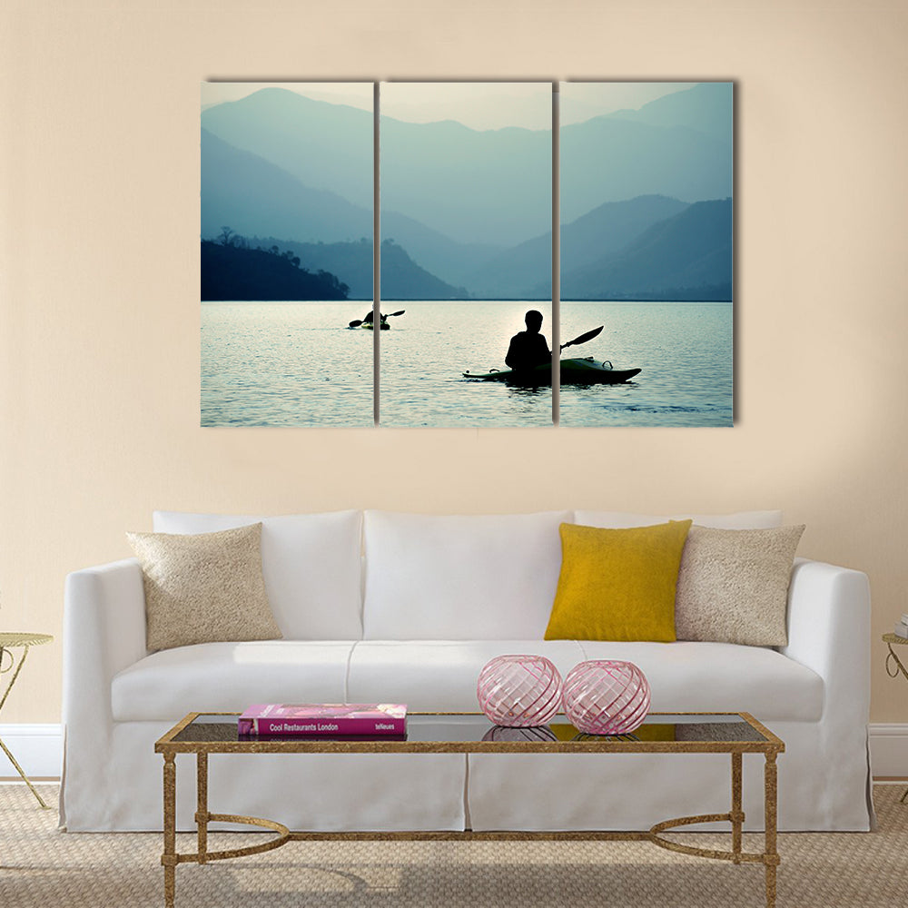 Kayaking at sunset in the mountains Multi panel canvas wall art