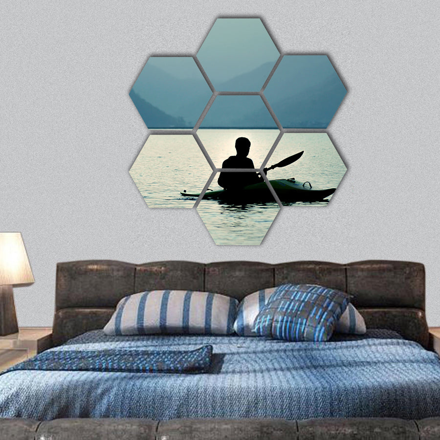 Kayaking at sunset in the mountains hexagonal canvas wall art