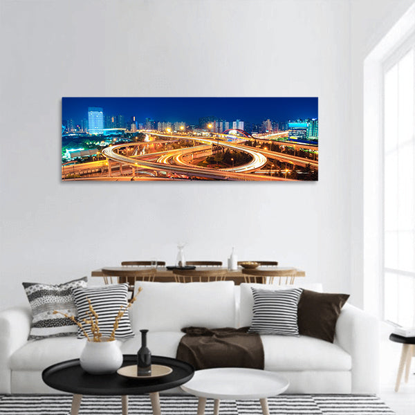 Modern city highway overpass at night panoramic canvas wall art