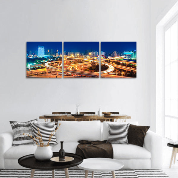Modern city highway overpass at night panoramic canvas wall art