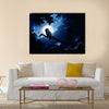 This is a photo of quiet night, bright moon, and Barred Owl sits motionless in the blue moonlight Multi panel canvas wall art