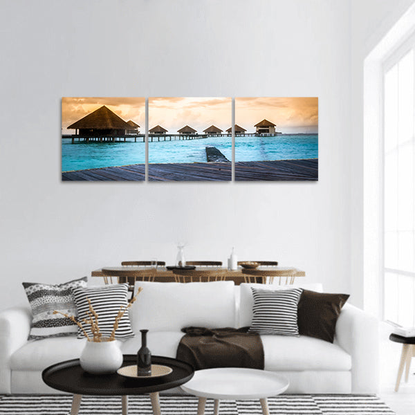 Over water bungalows with steps into amazing green lagoon panoramic canvas wall art