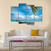 Maldivian house on a tropical island, travel background Multi panel canvas wall art