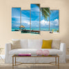 Maldivian house on a tropical island, travel background Multi panel canvas wall art