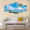 Maldivian house on a tropical island, travel background Multi panel canvas wall art