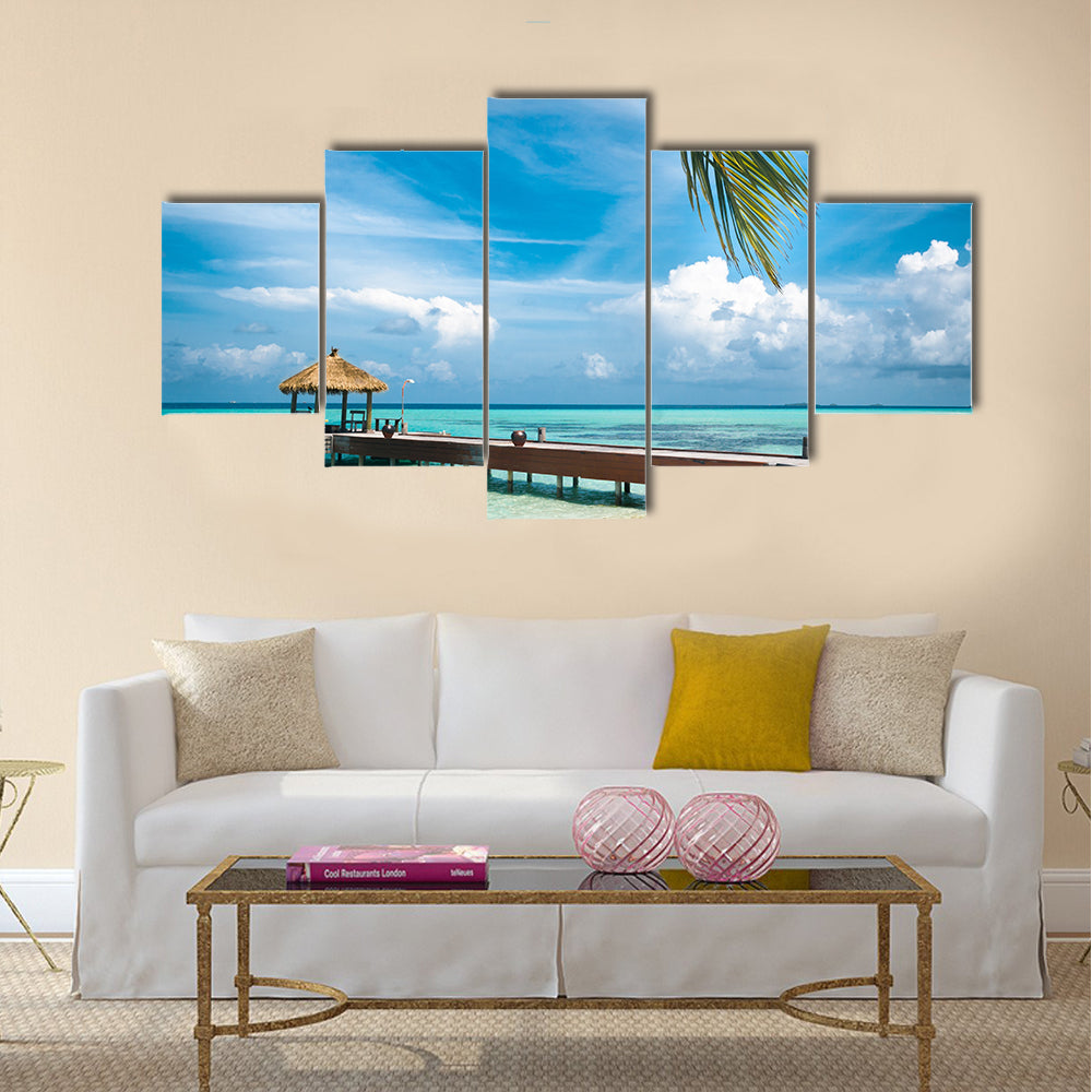 Maldivian house on a tropical island, travel background Multi panel canvas wall art