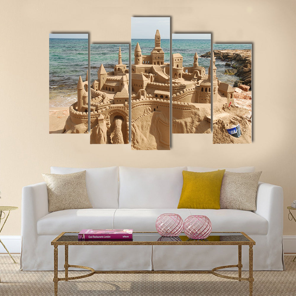 Amazing sandcastle on a mediterranean beach Multi Panel Canvas Wall Art