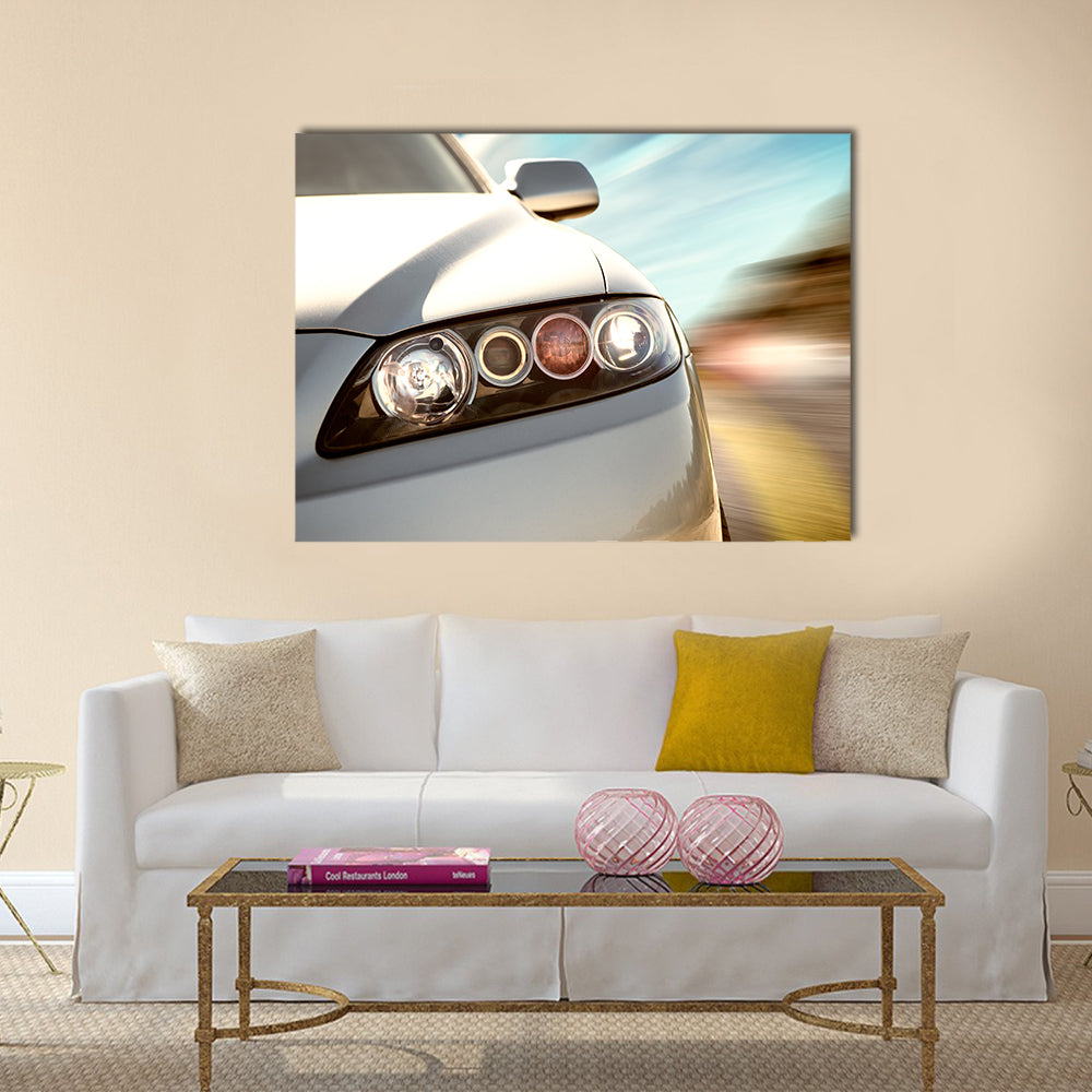 A car driving on a motorway at high speeds, overtaking other cars Multi panel canvas wall art