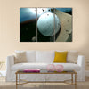 A white leather stitched cricket ball hitting a wooden cricket bat Multi Panel Canvas Wall Art