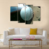 A white leather stitched cricket ball hitting a wooden cricket bat Multi Panel Canvas Wall Art