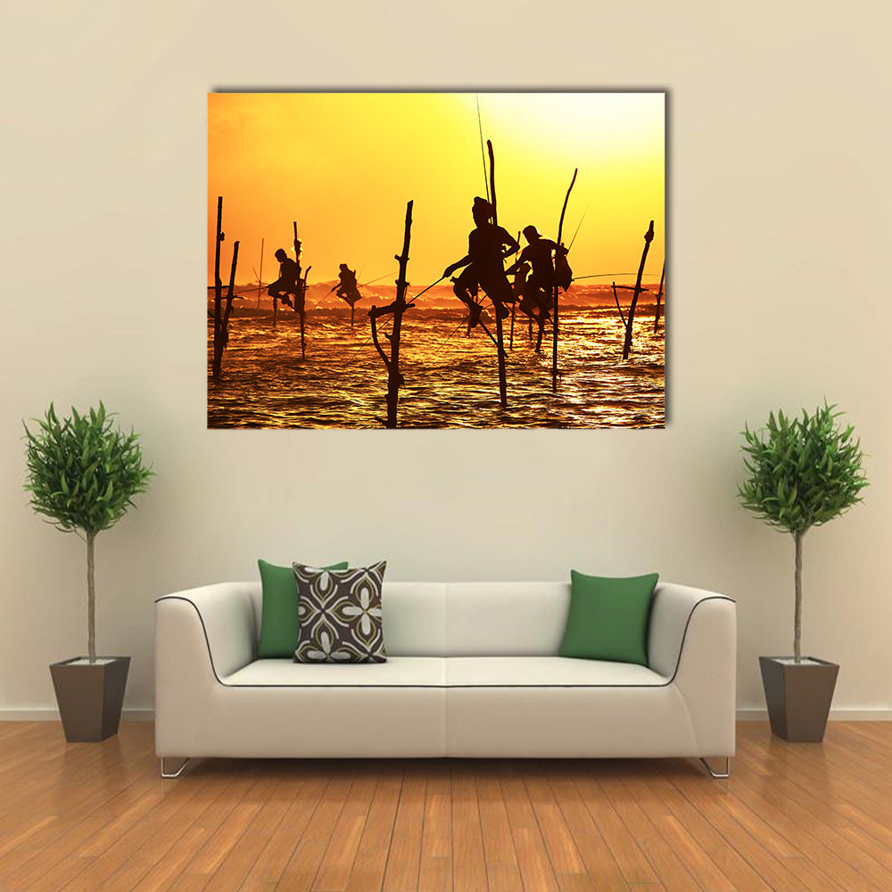 Silhouettes Of The Traditional Fishermen At The Sunset Near Galle In Sri Lanka Multi Panel Canvas Wall Art