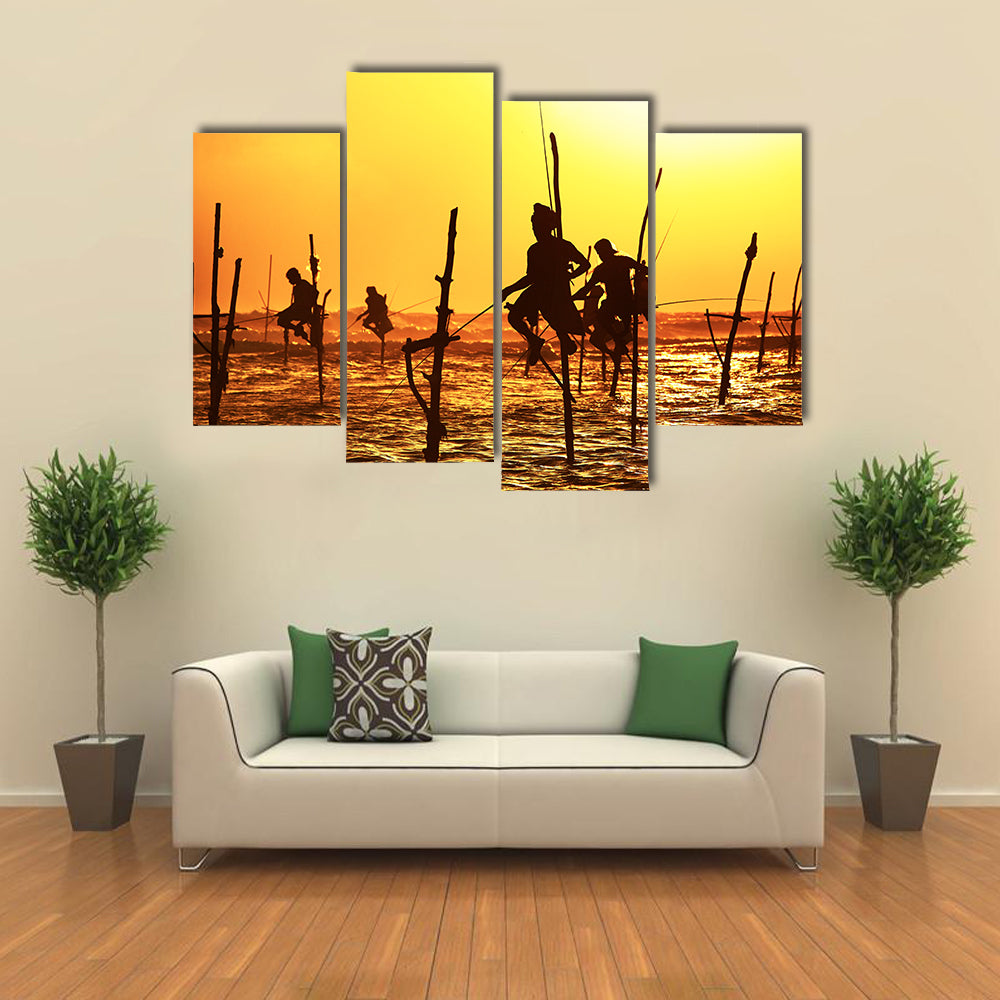 Silhouettes Of The Traditional Fishermen At The Sunset Near Galle In Sri Lanka Multi Panel Canvas Wall Art