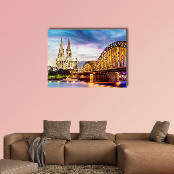 Illuminated Dom in Cologne with bridge and Rhine at sunset wall art