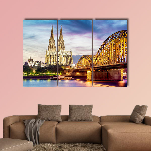 Illuminated Dom in Cologne with bridge and Rhine at sunset wall art