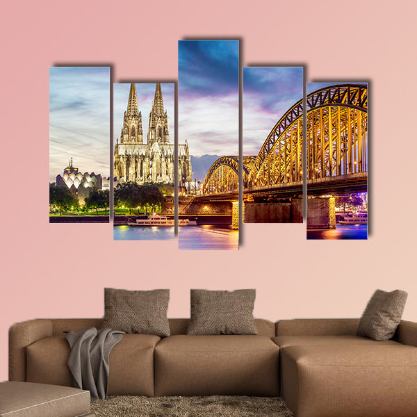 Illuminated Dom in Cologne with bridge and Rhine at sunset wall art