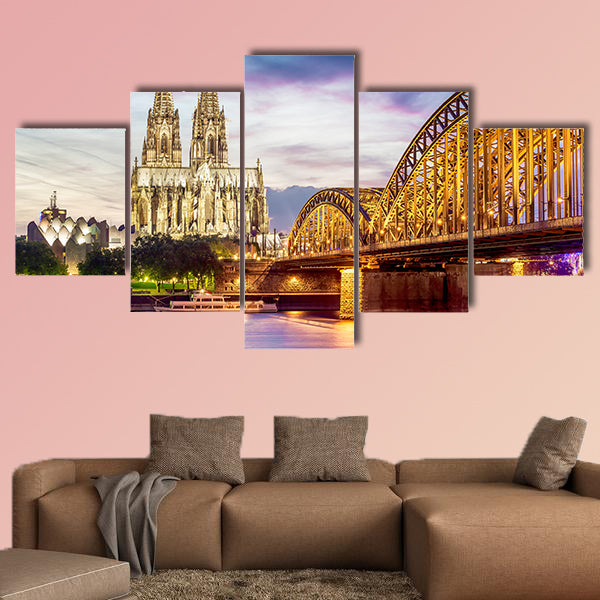 Illuminated Dom in Cologne with bridge and Rhine at sunset wall art