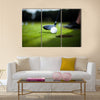 Golf ball on green meadow, driver Multi Panel Canvas Wall Art