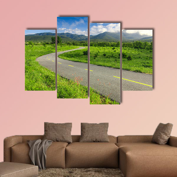 Beautiful countryside road under blue sky multi panel canvas wall art