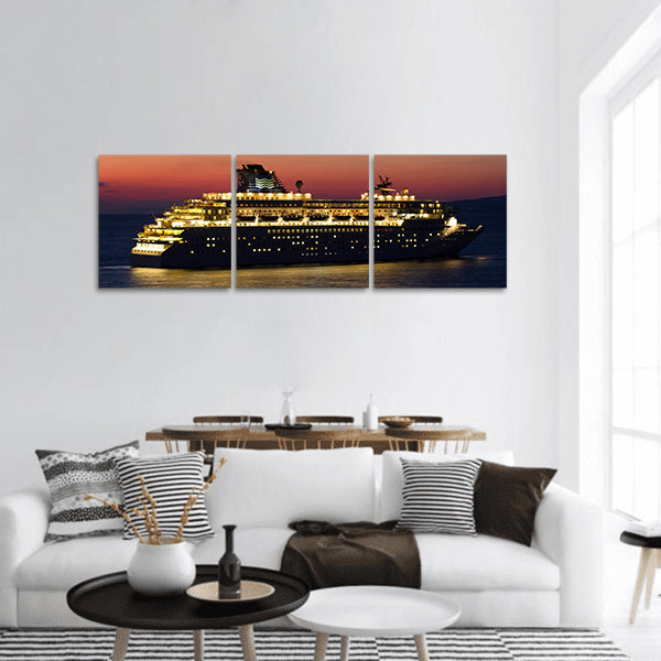 Big cruise ship with lights open at sunset panoramic canvas wall art