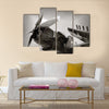 World War II era Navy fighter plane with folded wings Multi Panel Canvas Wall Art