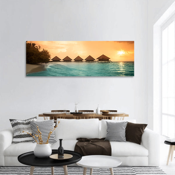 Over water bungalows with steps into amazing green lagoon panoramic canvas wall art