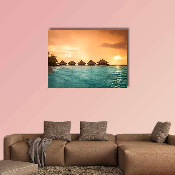 Over water bungalows with steps into amazing green lagoon multi panel canvas wall art