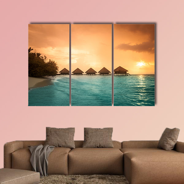 Over water bungalows with steps into amazing green lagoon multi panel canvas wall art