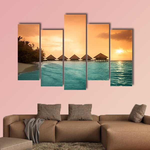 Over water bungalows with steps into amazing green lagoon multi panel canvas wall art