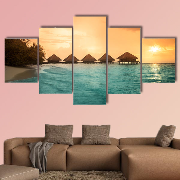 Over water bungalows with steps into amazing green lagoon multi panel canvas wall art