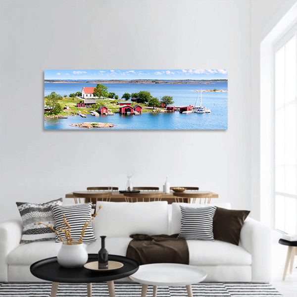Small village with red buildings in Finnish archipelago  panoramic canvas wall art