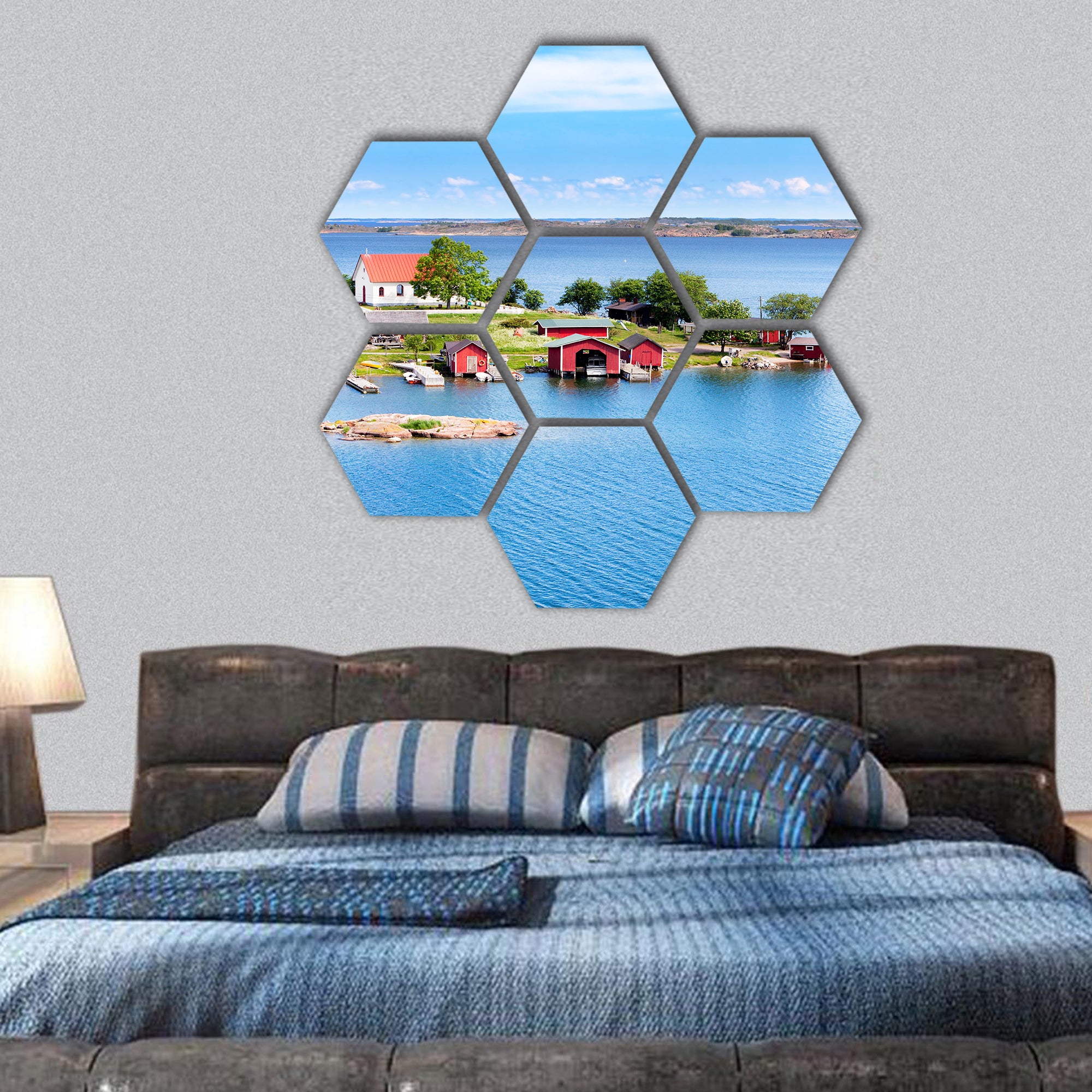 Small village with red buildings in Finnish archipelago hexagonal canvas wall art