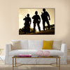 Silhouettes of S W A T officers holding their guns Multi Panel Canvas Wall Art