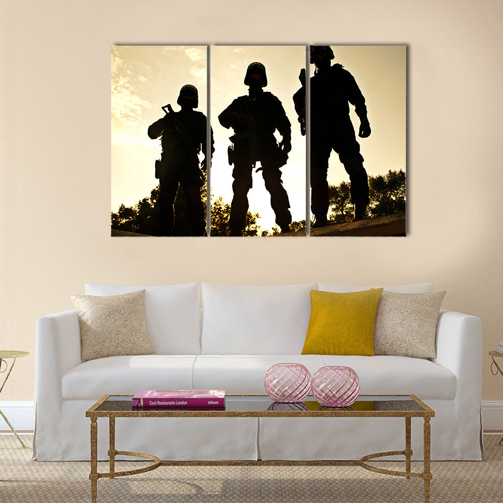 Silhouettes of SWAT officers holding their guns Multi Panel Canvas Wall Art