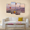 Hot air balloon flying over rock landscape at Cappadocia Turkey, multi panel canvas wall art