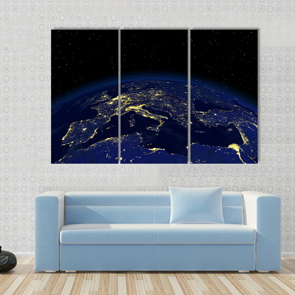 The view of a earth night side from space light Multi Panel Canvas Wall Art