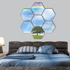 Oak tree in summer, blue sky with rainbow hexagonal canvas wall art