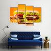 Delicious hamburgers on wood Multi panel canvas wall art