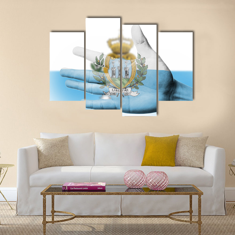 Cheering fan with painting national San Marino flag with your hand for cheer your national sport Multi panel canvas wall art
