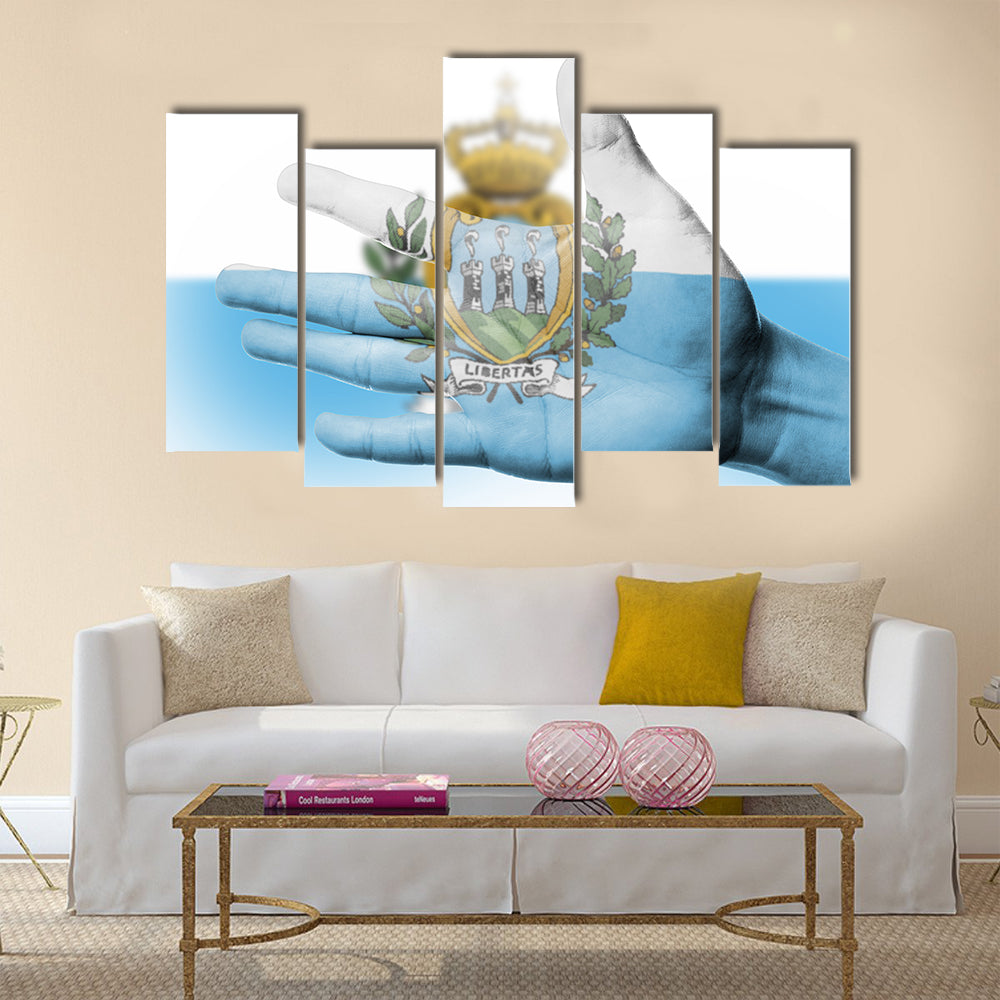 Cheering fan with painting national San Marino flag with your hand for cheer your national sport Multi panel canvas wall art