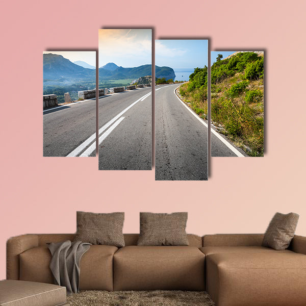 Turning mountain highway with sky and sea on a background wall art