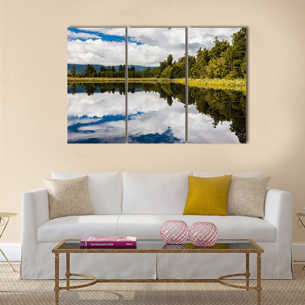 The dramatic reflections on Lake Matheson near Fox Glacier South Island New Zealand multi panel canvas wall art