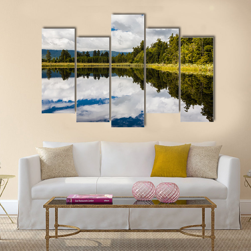 The dramatic reflections on Lake Matheson near Fox Glacier South Island New Zealand multi panel canvas wall art