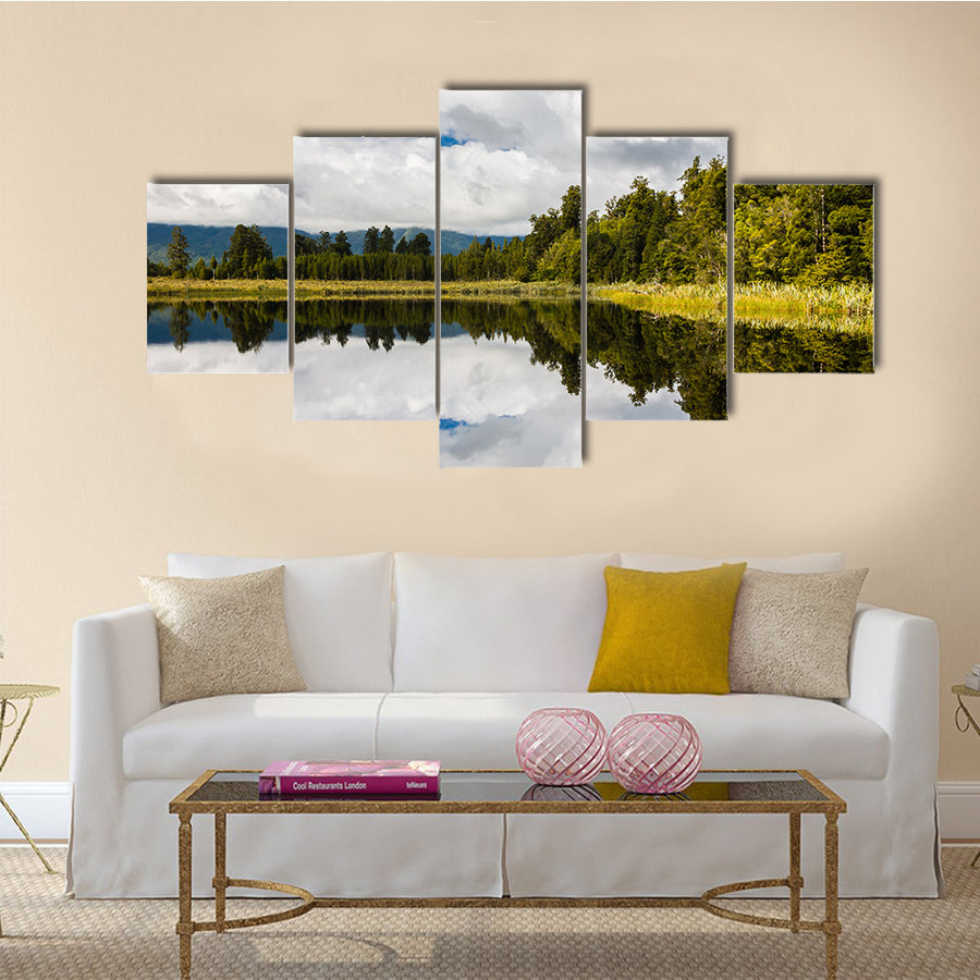 The dramatic reflections on Lake Matheson near Fox Glacier South Island New Zealand multi panel canvas wall art