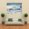 Beautiful snow-capped mountains against the blue sky in Antarctica Multi panel canvas wall art