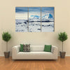 Beautiful snow-capped mountains against the blue sky in Antarctica Multi panel canvas wall art