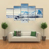 Beautiful snow-capped mountains against the blue sky in Antarctica Multi panel canvas wall art