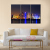 Doha, Qatar at Dusk is a beautiful city skyline of impressive contemporary architecture Multi panel canvas wall art