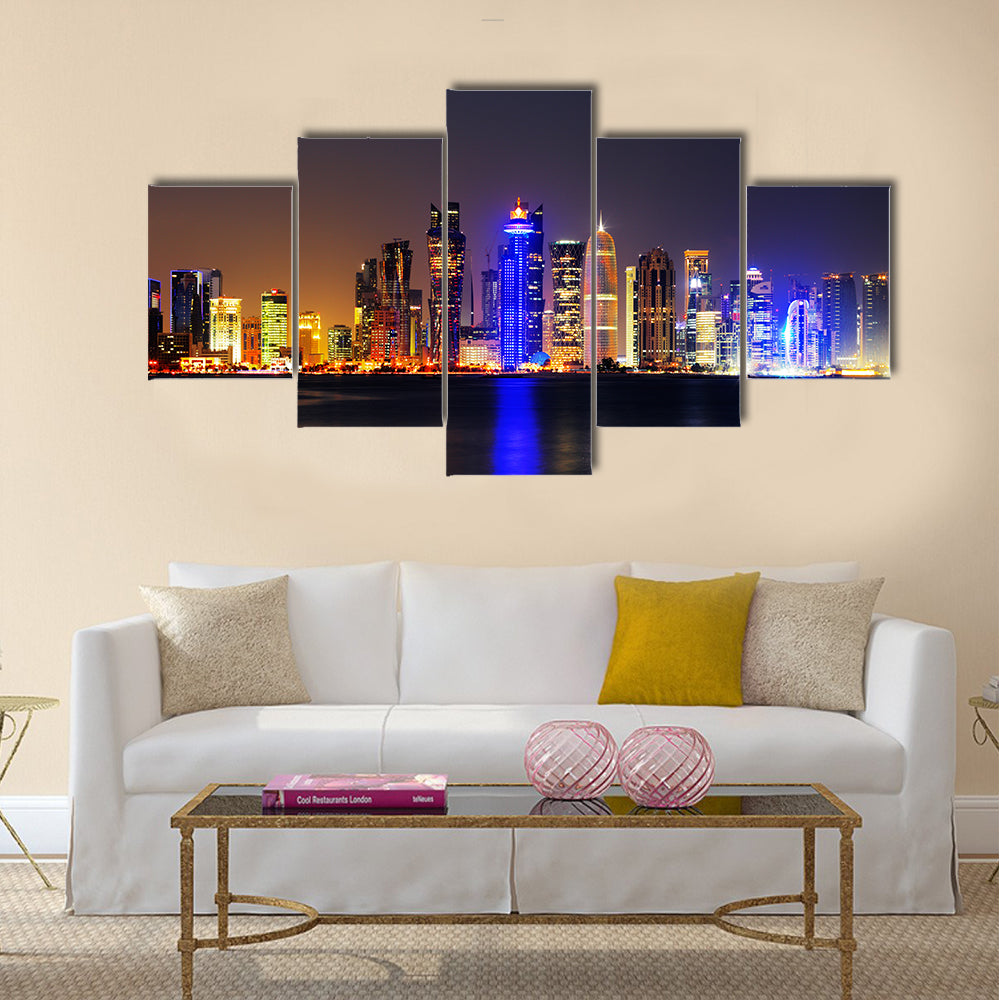 Doha, Qatar at Dusk is a beautiful city skyline of impressive contemporary architecture Multi panel canvas wall art